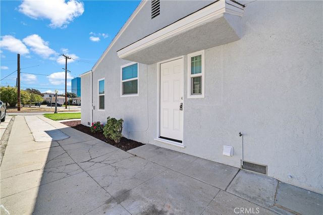 a front view of a house with entertaining space