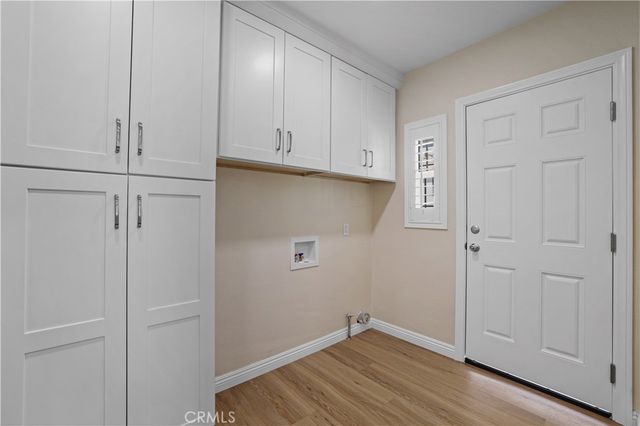 a view of room with hardwood floor