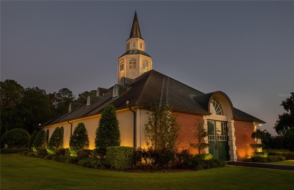 6800 Northwest 193rd Street, Unit OPTION 1 Reddick, FL 32686 - Photo 21 of 32 a swimming pool with barbeque oven in front of it