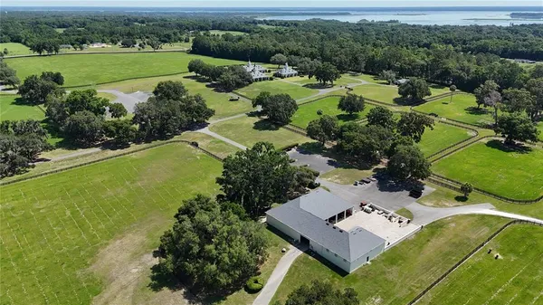 an aerial view of a house with a garden