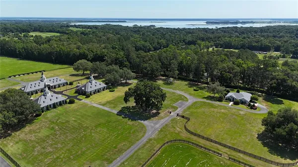 an aerial view of a house with a garden