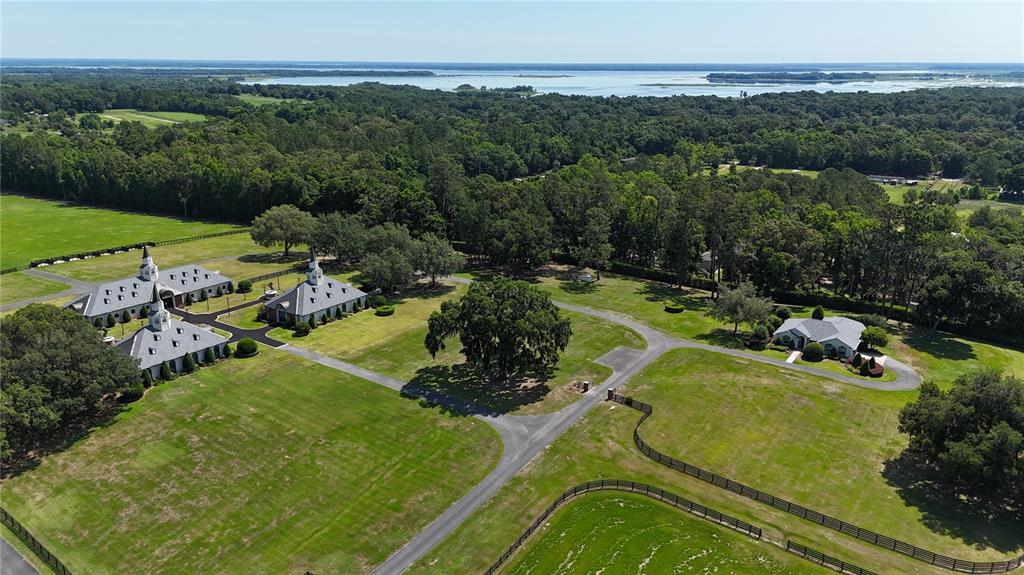 6800 Northwest 193rd Street, Unit OPTION 1 Reddick, FL 32686 - Photo 30 of 32 an aerial view of a house with a garden