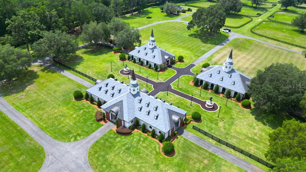 6800 Northwest 193rd Street, Unit OPTION 1 Reddick, FL 32686 - Photo 5 of 32 an aerial view of a table and chairs