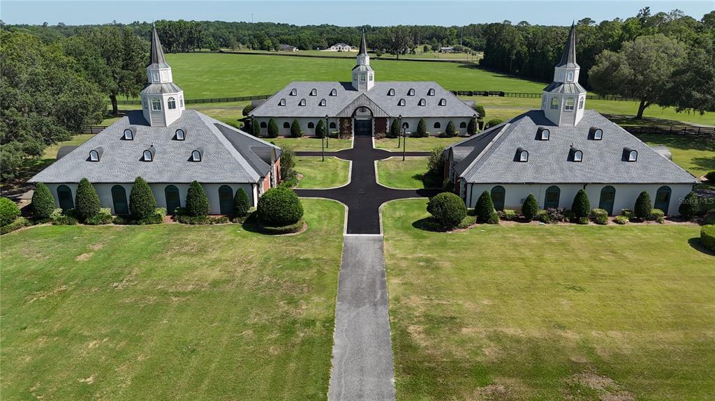 6800 Northwest 193rd Street, Unit OPTION 1 Reddick, FL 32686 - Photo 7 of 32 a front view of a house with garden