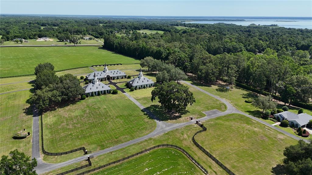 6800 Northwest 193rd Street, Unit OPTION 1 Reddick, FL 32686 - Photo 8 of 32 a view of a swimming pool and outdoor space