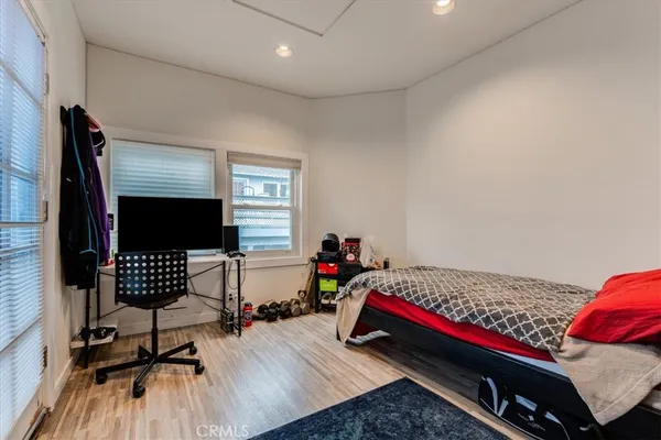 a living room with a couch and a flat screen tv
