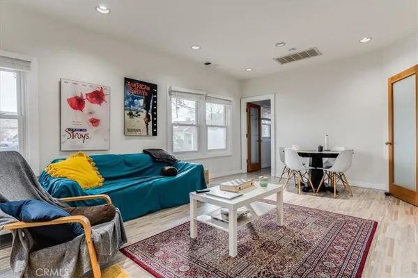 a living room with furniture and a table