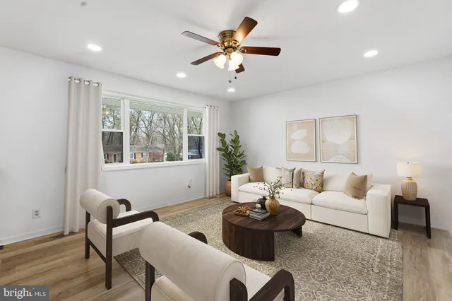 a living room with furniture and window