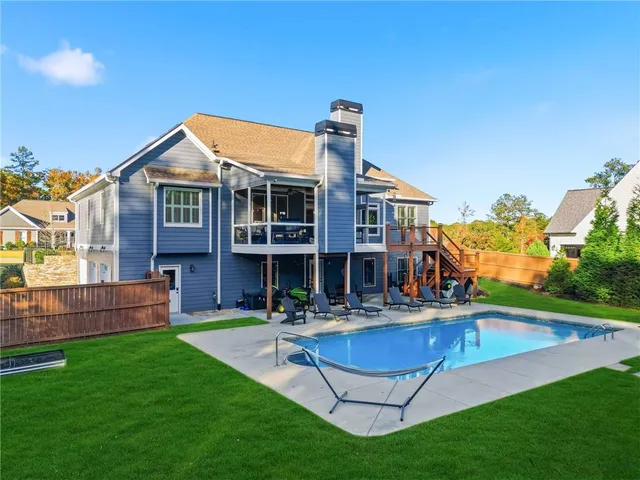 a picture of a bathroom with a shower