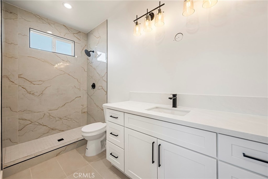 7278 Pentz Road Paradise, CA 95969 - Photo 21 of 36 a bathroom with a sink a toilet and shower