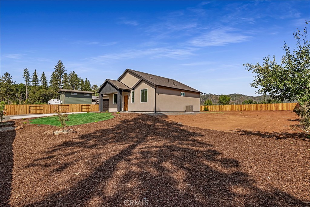 7278 Pentz Road Paradise, CA 95969 - Photo 8 of 36 a front view of a house with a yard and lake view