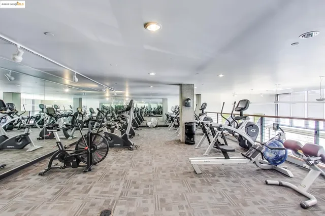a view of a house with swimming pool and sitting area