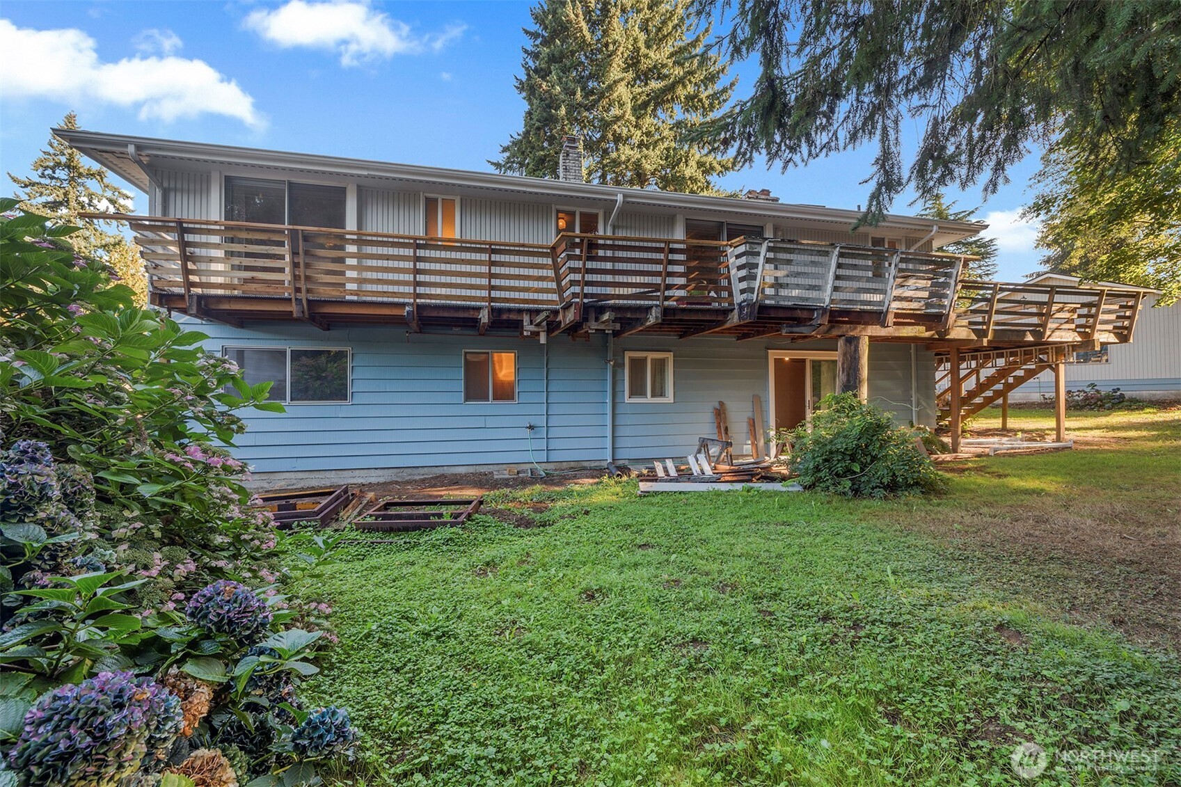 1027 South 112th Street Seattle, WA 98168 - Photo 26 of 33 a front view of a house with garden