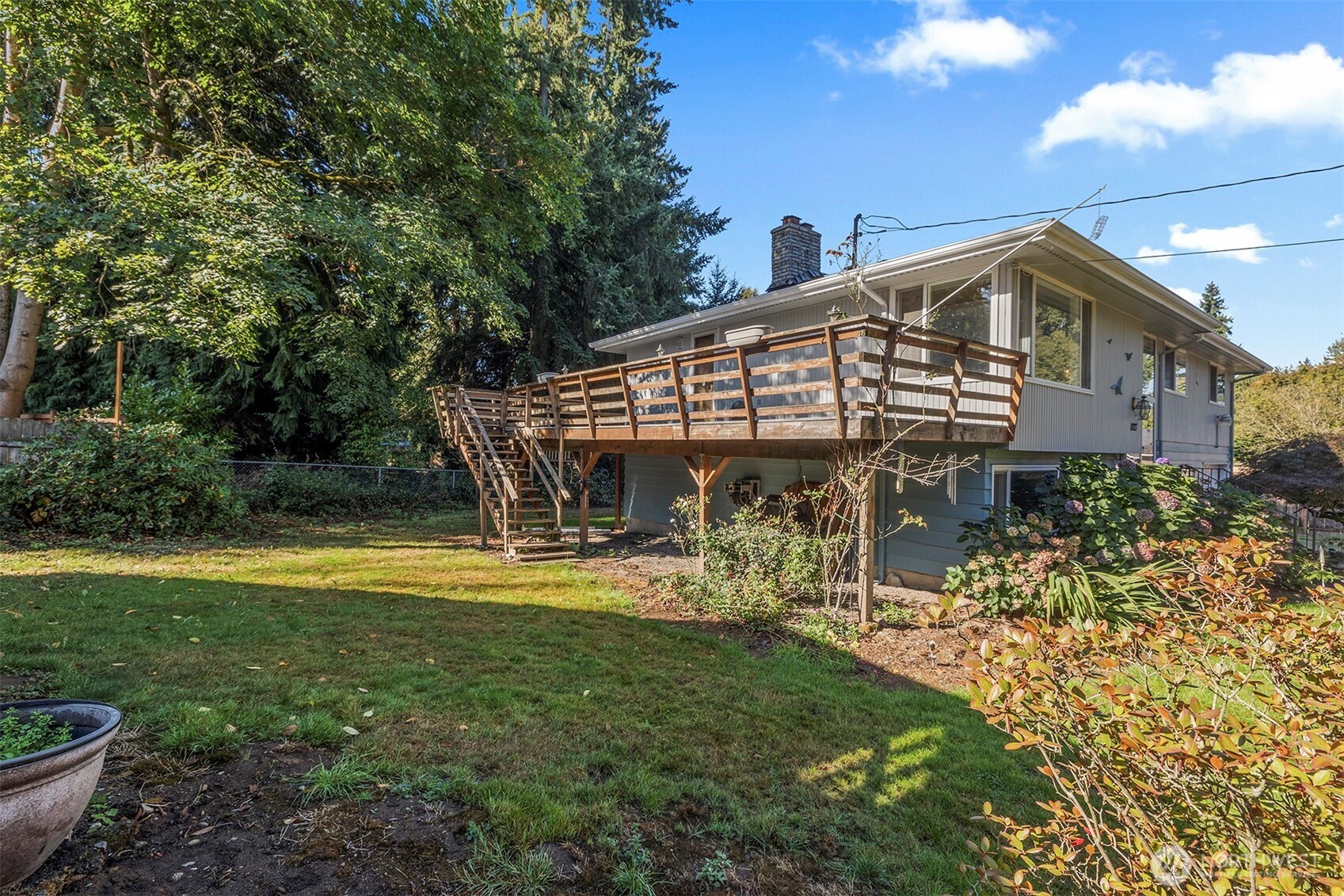1027 South 112th Street Seattle, WA 98168 - Photo 33 of 33 a view of a house with backyard and sitting area
