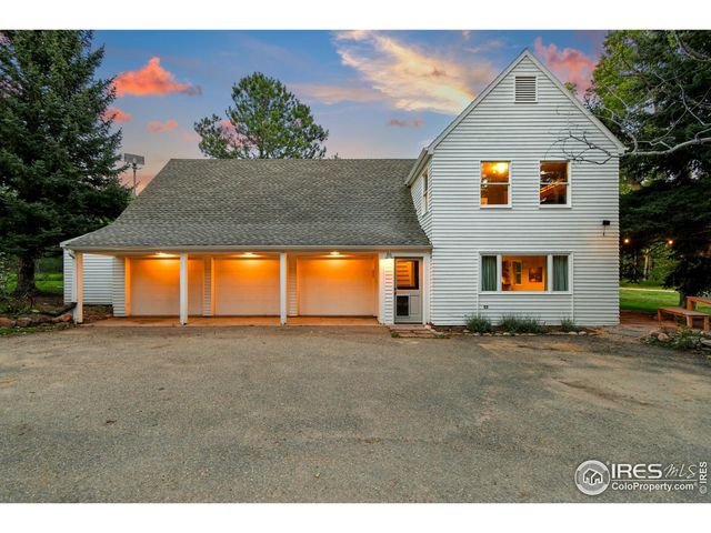a view of an house with backyard space and sitting area