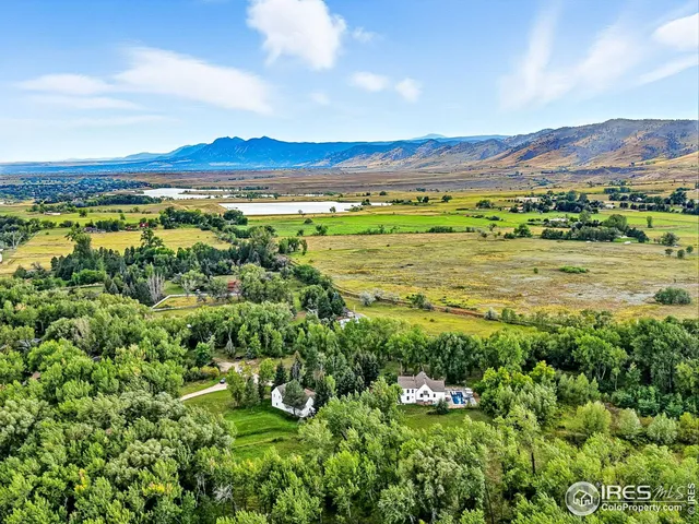 a view of an outdoor space and a mountain