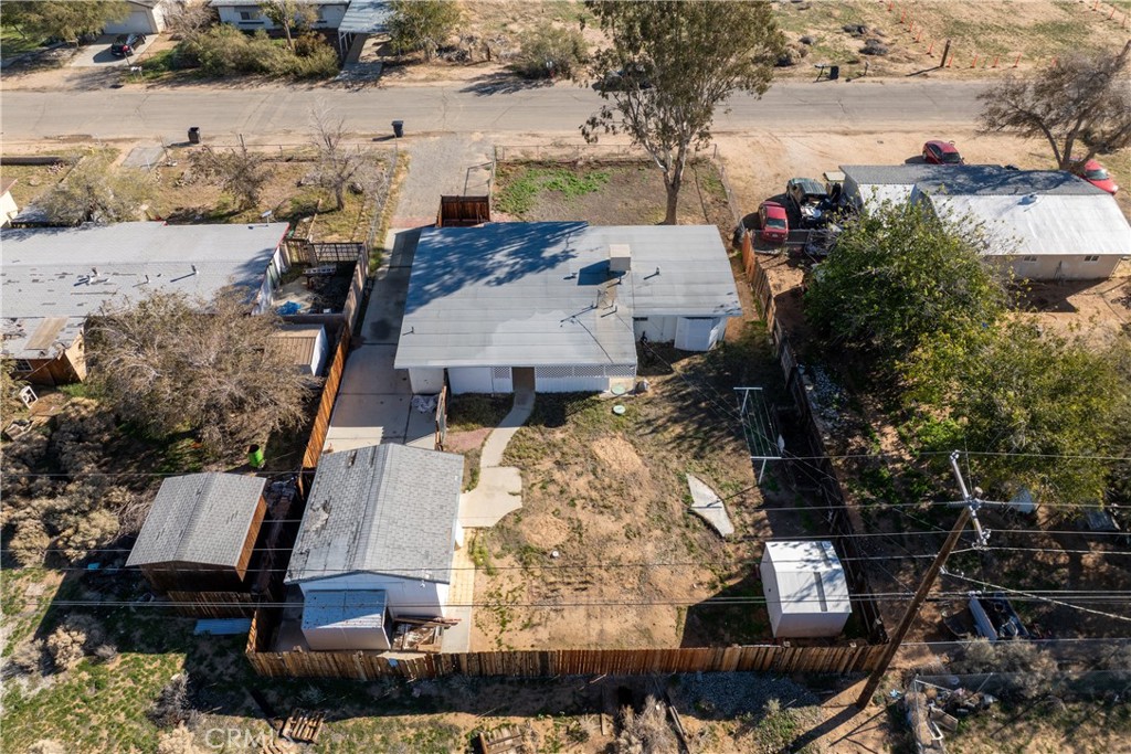 13445 Fran Street Edwards, CA 93523 - Photo 23 of 27 an aerial view of a house with a yard and lake view