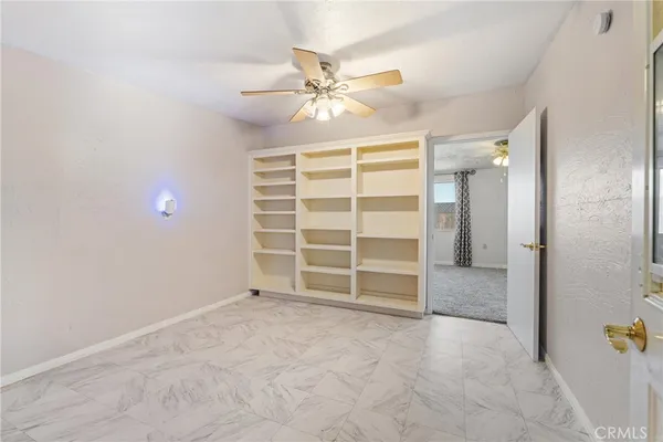 a utility room with closet dryer and washer
