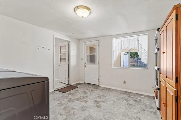 a view of a hallway with entryway