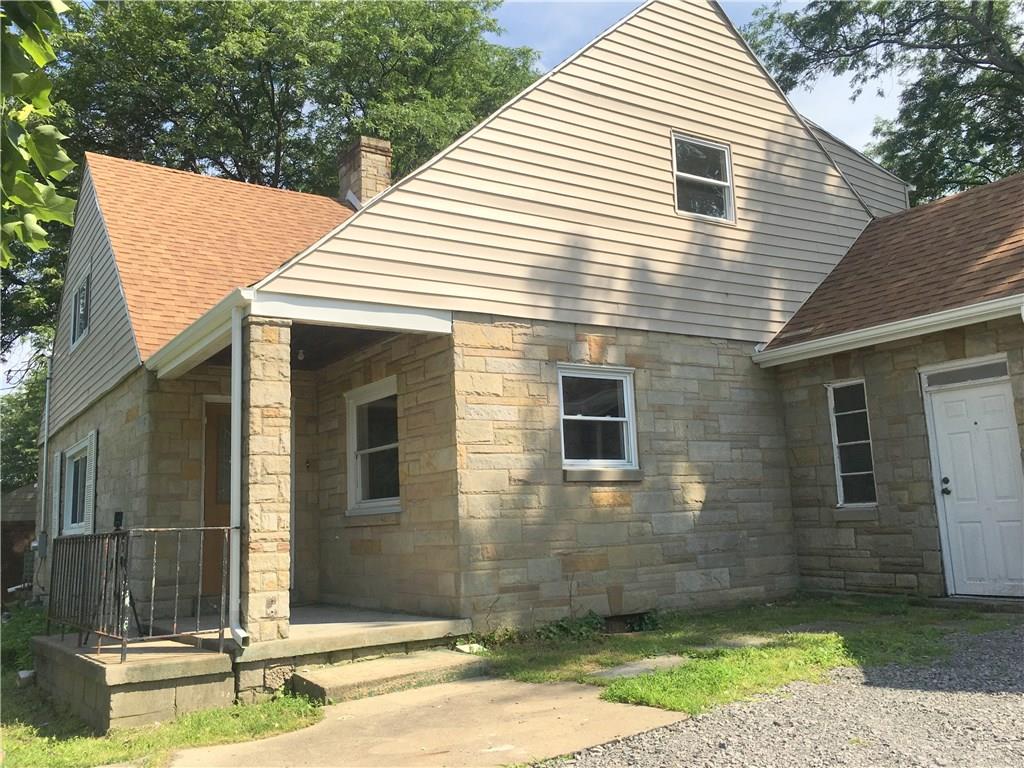 241 Alameda Road Butler, PA 16001 - Photo 23 of 24 Front entrance with view of the covered front porch. A second front porch is on the opposing side and is near the annexed in-law suite.