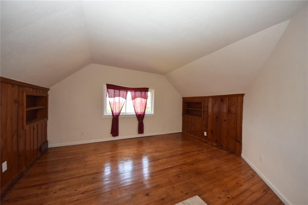 241 Alameda Road Butler, PA 16001 - Photo 5 of 24 Upper floor room could serve as a study or an office space. Room provides hardwood flooring and solid wood built-in shelving.