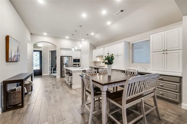 a view of a dining room with furniture