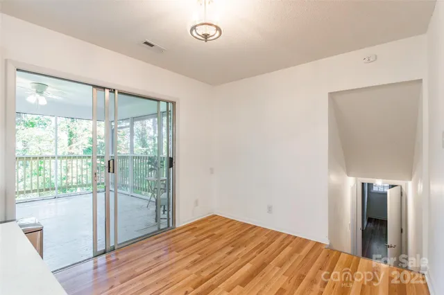 a view of hallway with a large window
