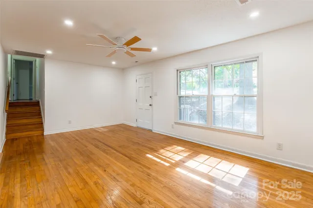 a view of an empty room and window