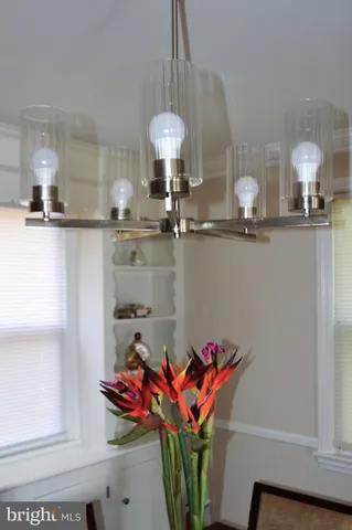 a view of a kitchen with a sink and a window