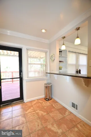 a bathroom with a shower a toilet and a sink