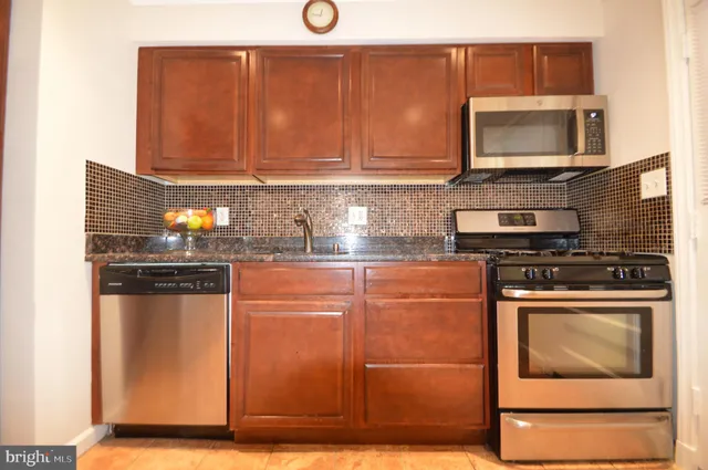 a utility room with washer and dryer