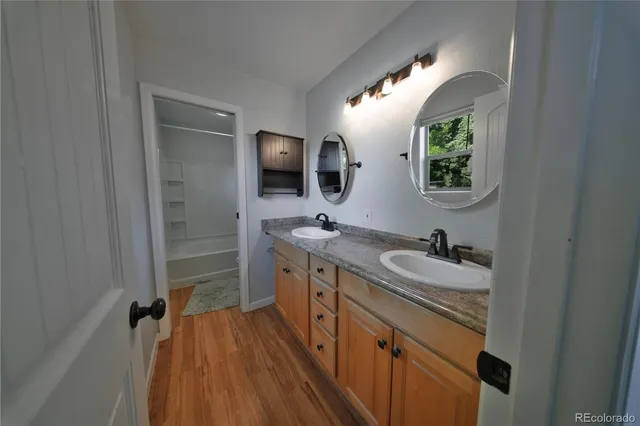 a bathroom with a toilet a sink and a bathtub