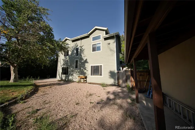 a backyard of a house with lots of green space