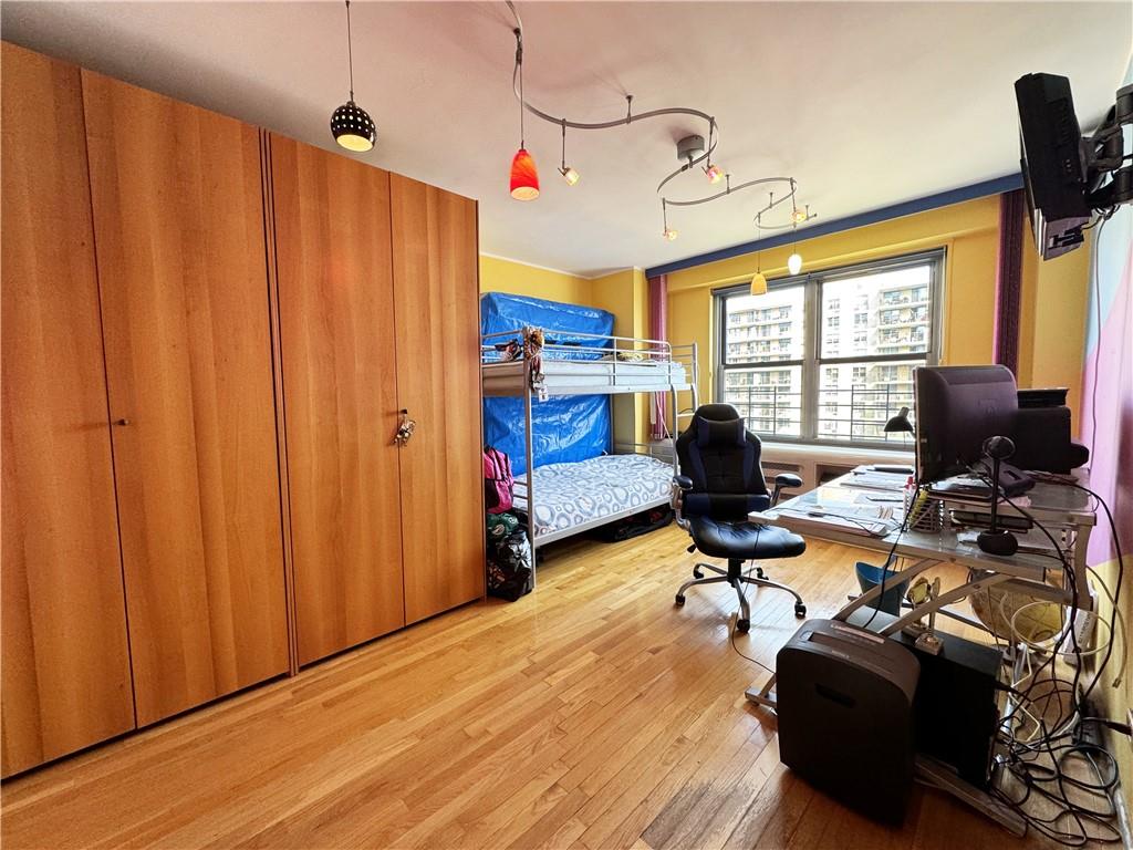 601 Surf Avenue, Unit 18E Brooklyn, NY 11224 - Photo 11 of 24 a view of a livingroom with workspace and a window