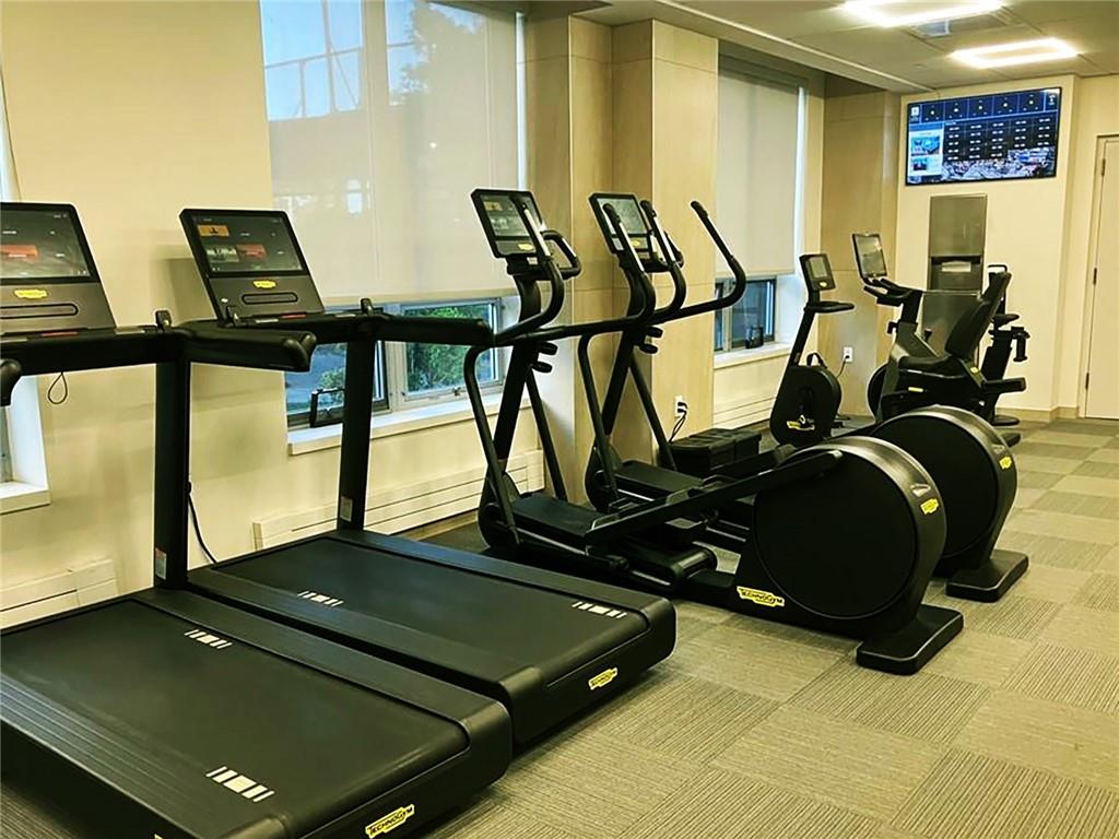 601 Surf Avenue, Unit 18E Brooklyn, NY 11224 - Photo 21 of 24 a living room with gym equipment