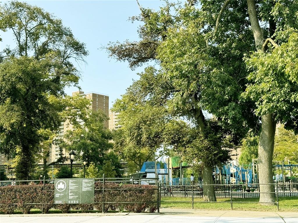 601 Surf Avenue, Unit 18E Brooklyn, NY 11224 - Photo 23 of 24 front view of a residential houses with yard