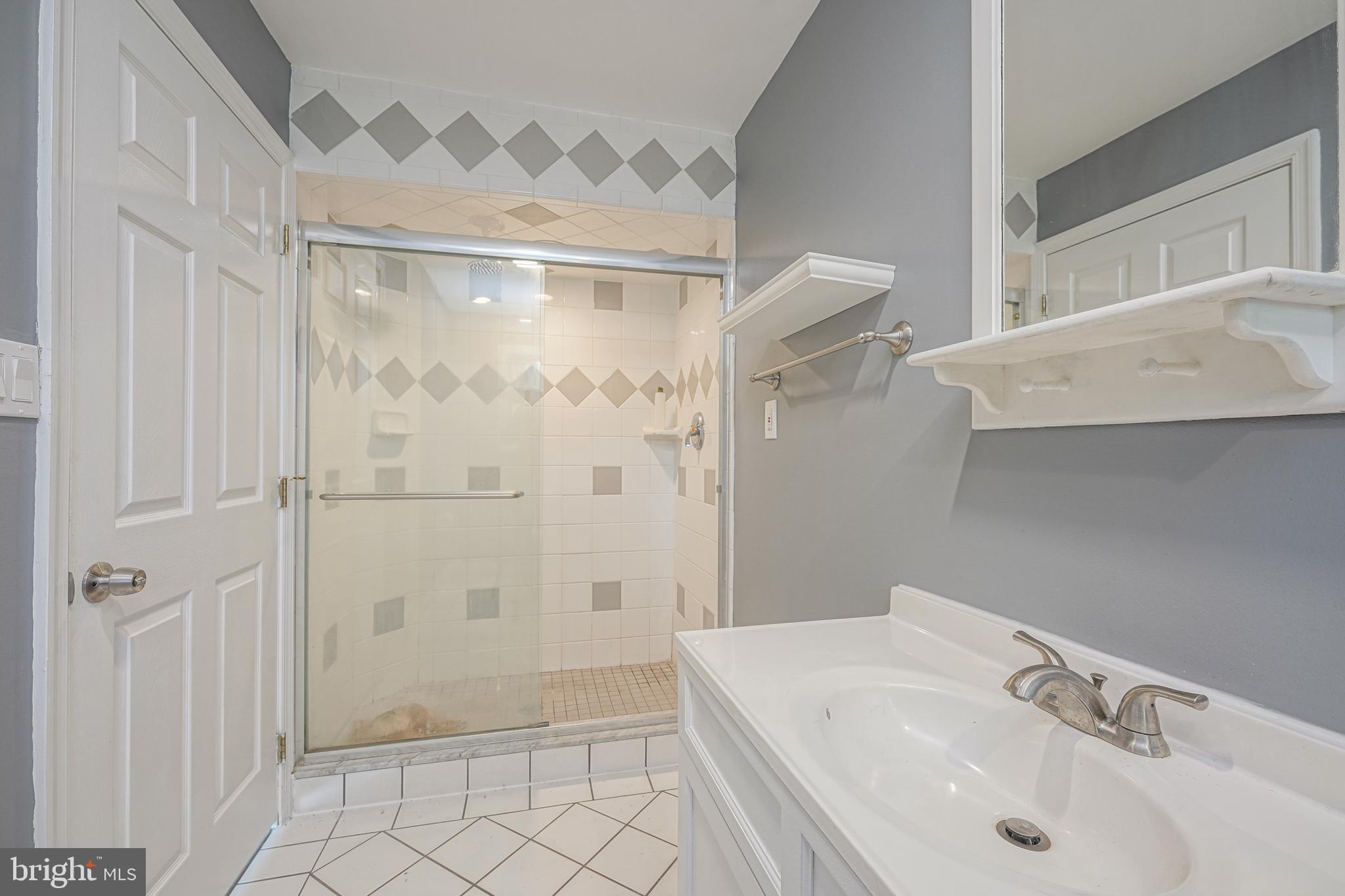 153 Hopewell Road Marlton, NJ 08053 - Photo 29 of 68 a bedroom with a bed and wooden floor