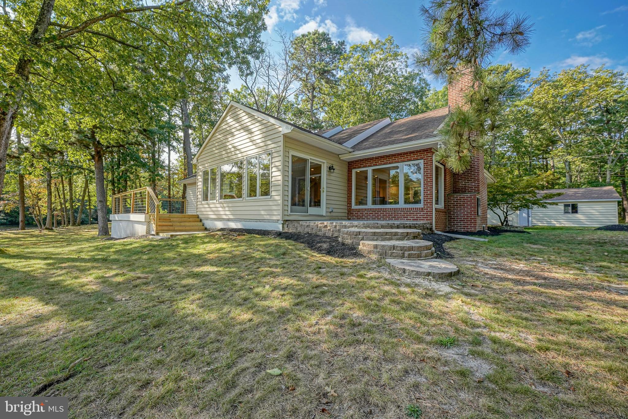 153 Hopewell Road Marlton, NJ 08053 - Photo 4 of 68 a front view of house with yard and green space