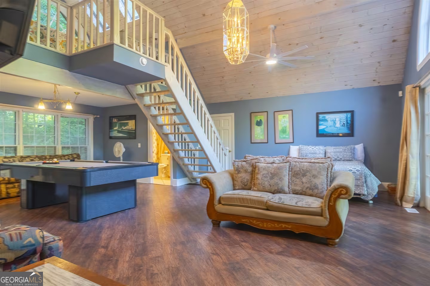 144 Fussen Strasse Helen, GA 30545 - Photo 15 of 38 a living room with furniture and a wooden floor