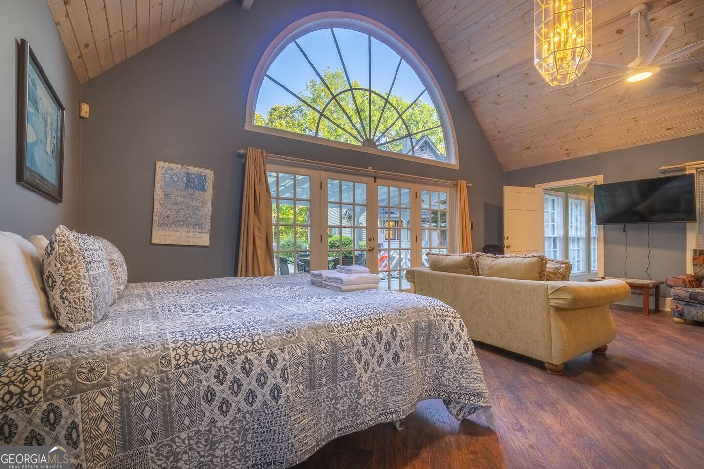 144 Fussen Strasse Helen, GA 30545 - Photo 17 of 38 a bedroom with a bed and a large window