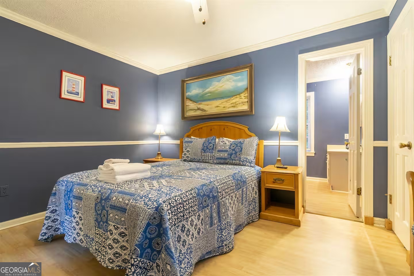 144 Fussen Strasse Helen, GA 30545 - Photo 22 of 38 a bedroom with a bed and a dresser