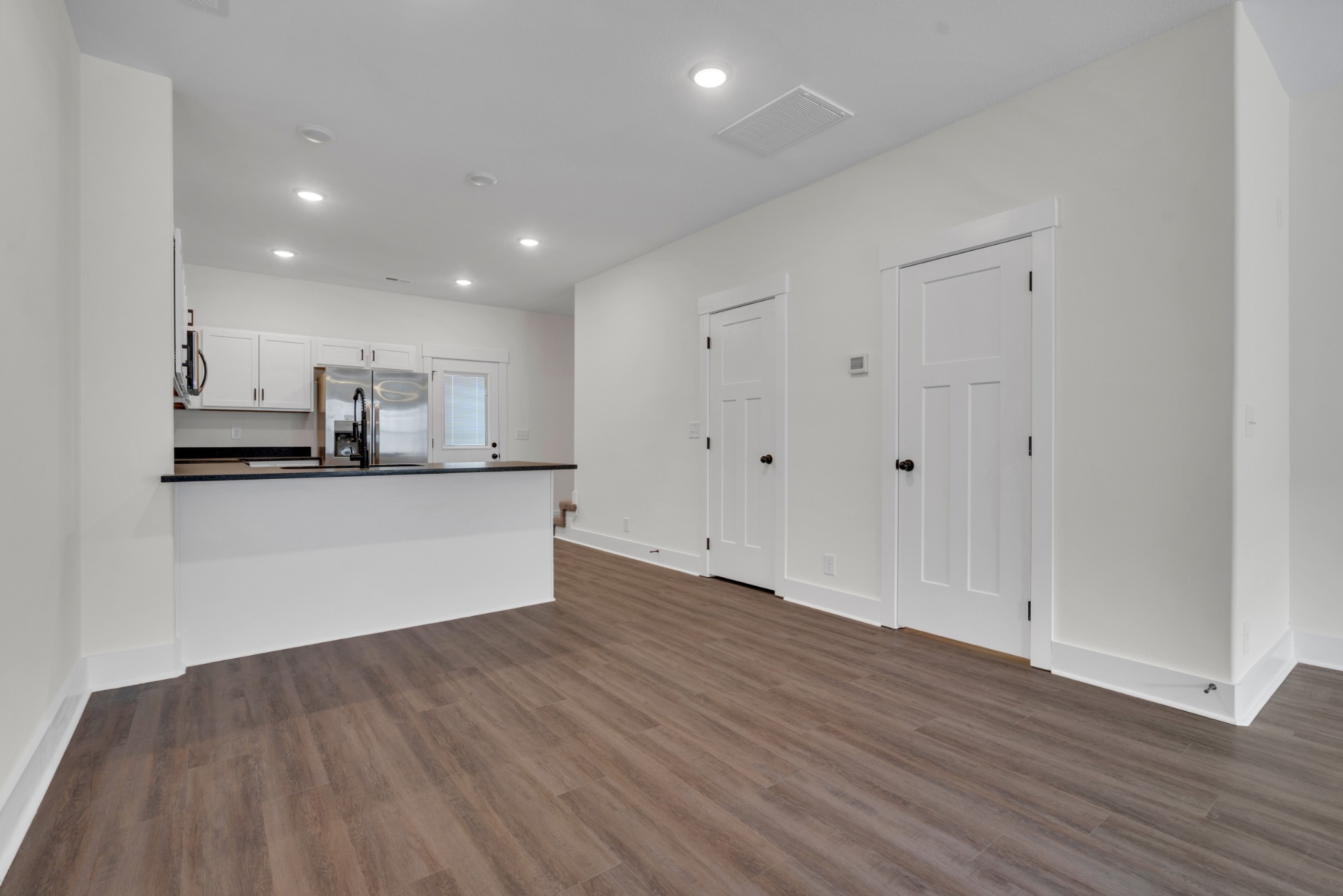 119 Front Rdg Circle Clarksville, TN 37042 - Photo 13 of 41 a view of kitchen with wooden floor and electronic appliances