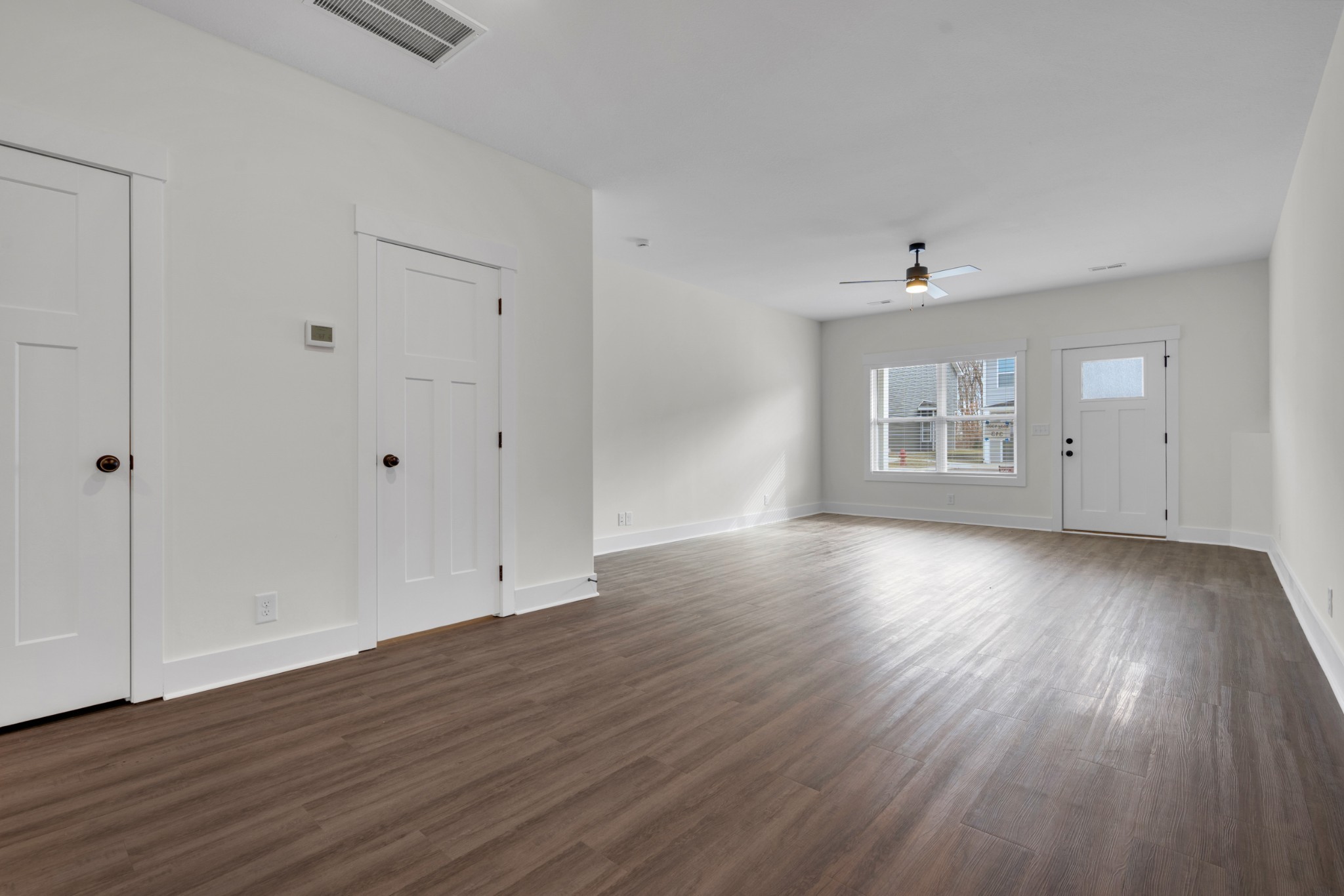 119 Front Rdg Circle Clarksville, TN 37042 - Photo 14 of 41 wooden floor in an empty room with a window