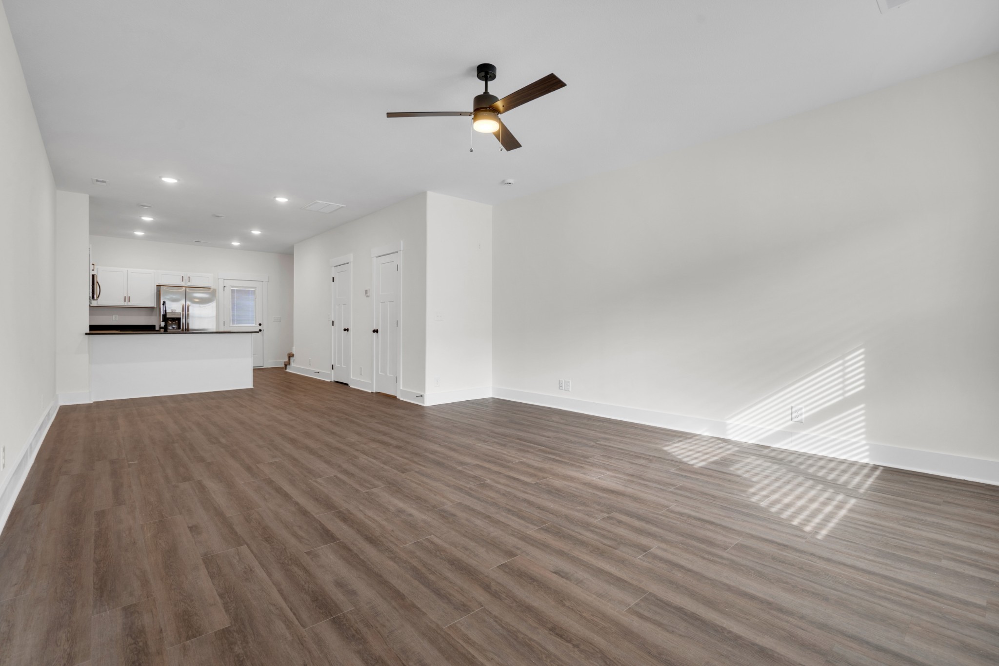 119 Front Rdg Circle Clarksville, TN 37042 - Photo 8 of 41 a view of empty room with wooden floor and ceiling fan