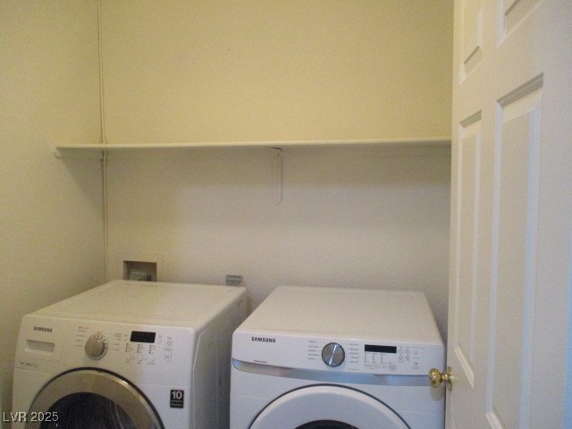 811 Wintersweet Road Henderson, NV 89015 - Photo 33 of 60 Laundry room featuring washer and clothes dryer
