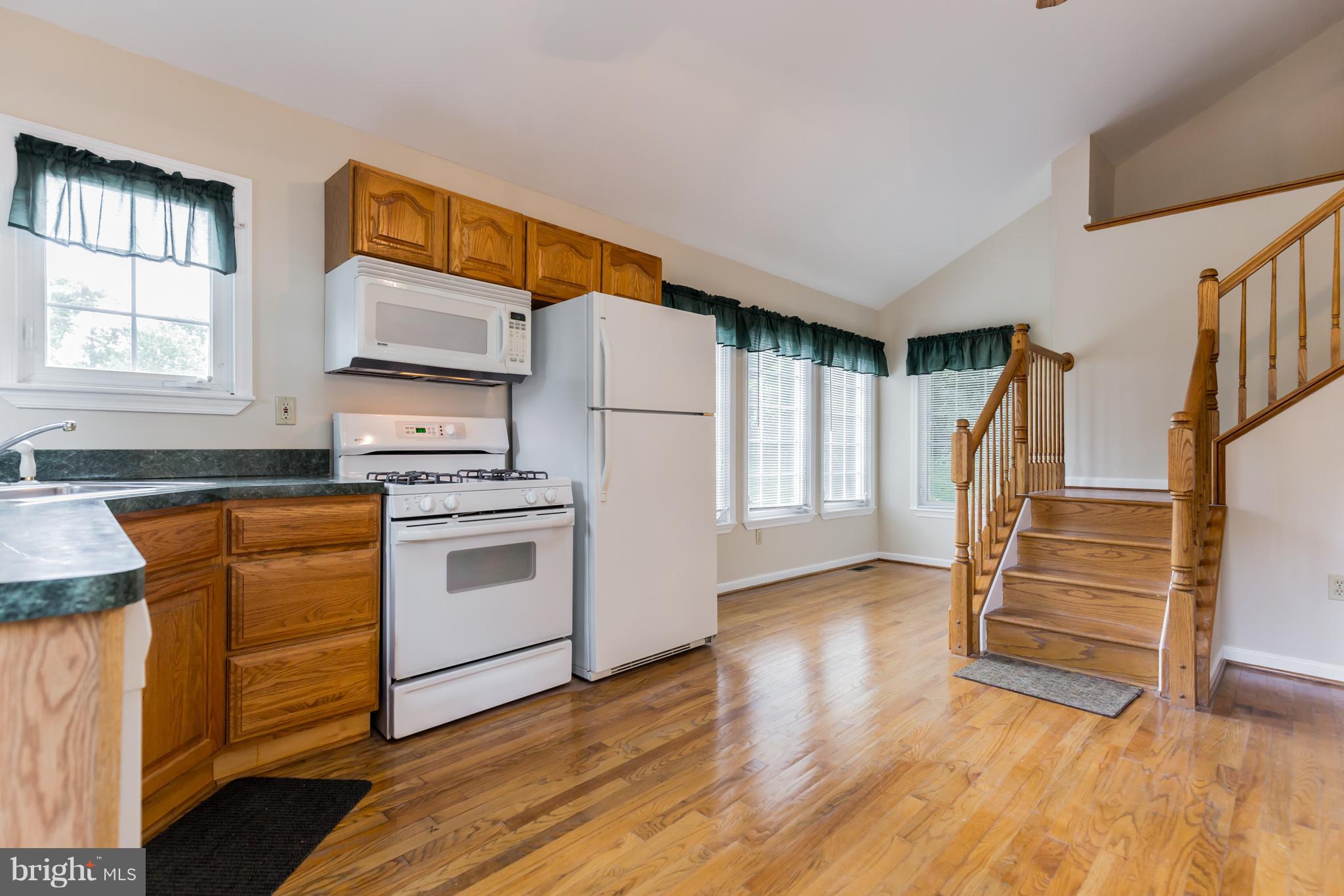 5875 Bayside Road St. Leonard, MD 20685 - Photo 10 of 29 Kitchen w/Breakfast Nook, stairs to MBR