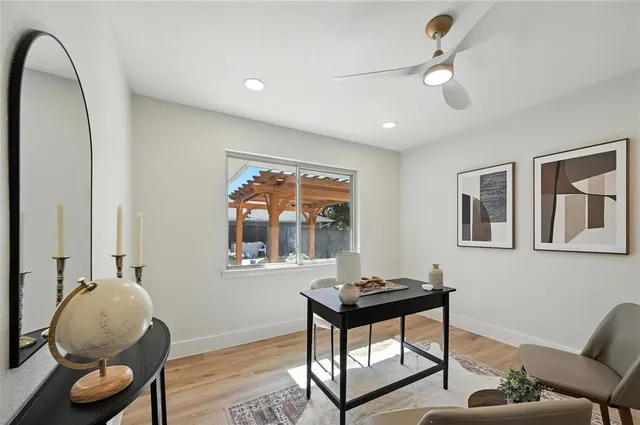 a workspace with furniture and window