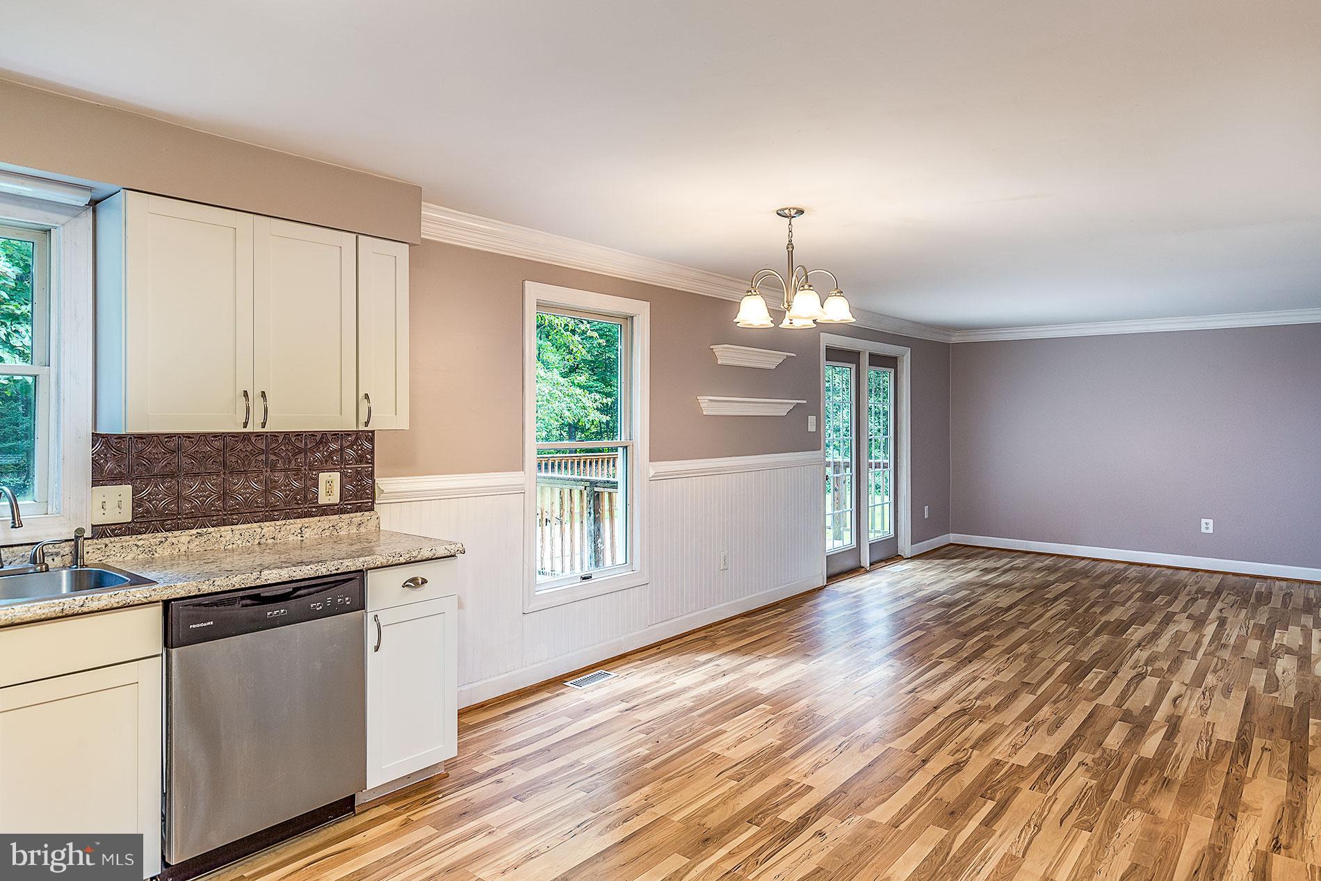 12104 Ward Road King George, VA 22485 - Photo 18 of 19 Open Floor Plan Leading to the Living Room