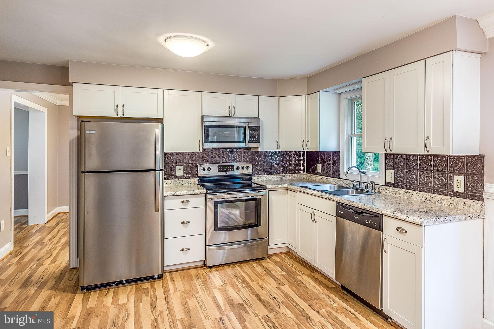 12104 Ward Road King George, VA 22485 - Photo 3 of 19 Renovated Kitchen with Stainless Steel Appliances