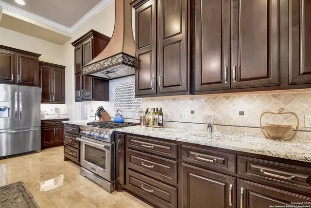 a view of a dining room with furniture large windows and wooden floor